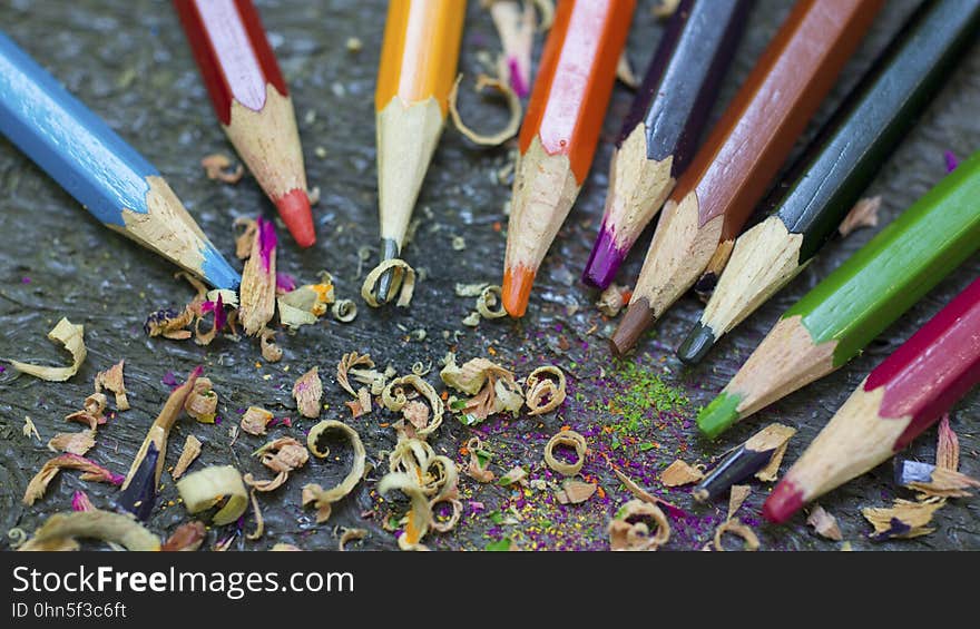 Colorful drawing pencils in semicircle with shavings. Colorful drawing pencils in semicircle with shavings.