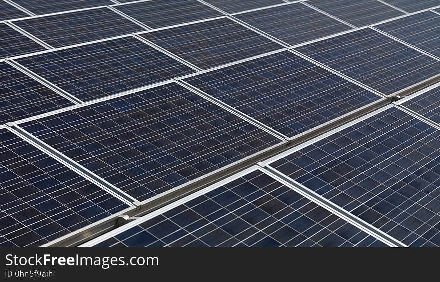 A close up of photovoltaic solar panel array. A close up of photovoltaic solar panel array.