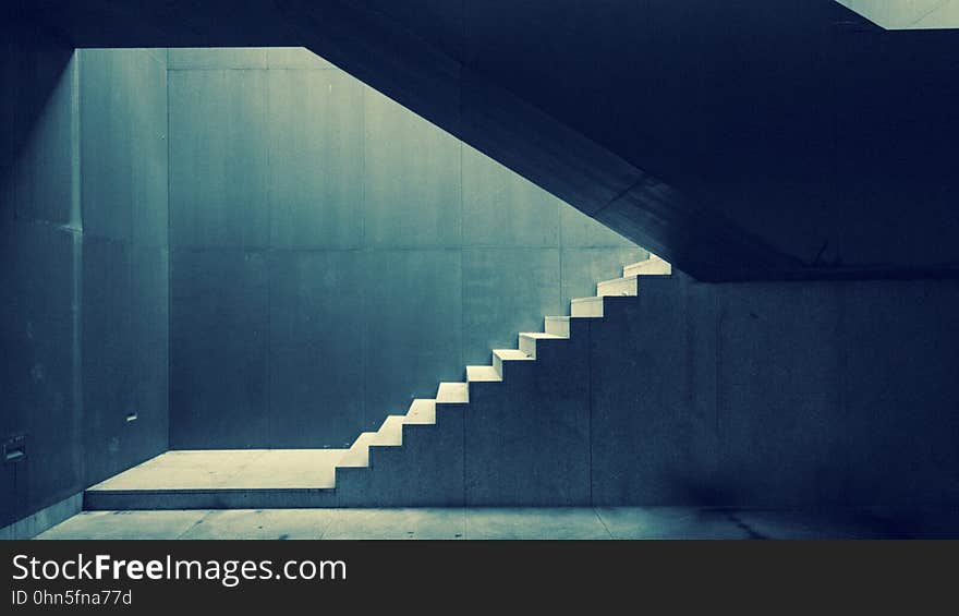 An urban concrete stairwell and stairs. An urban concrete stairwell and stairs.