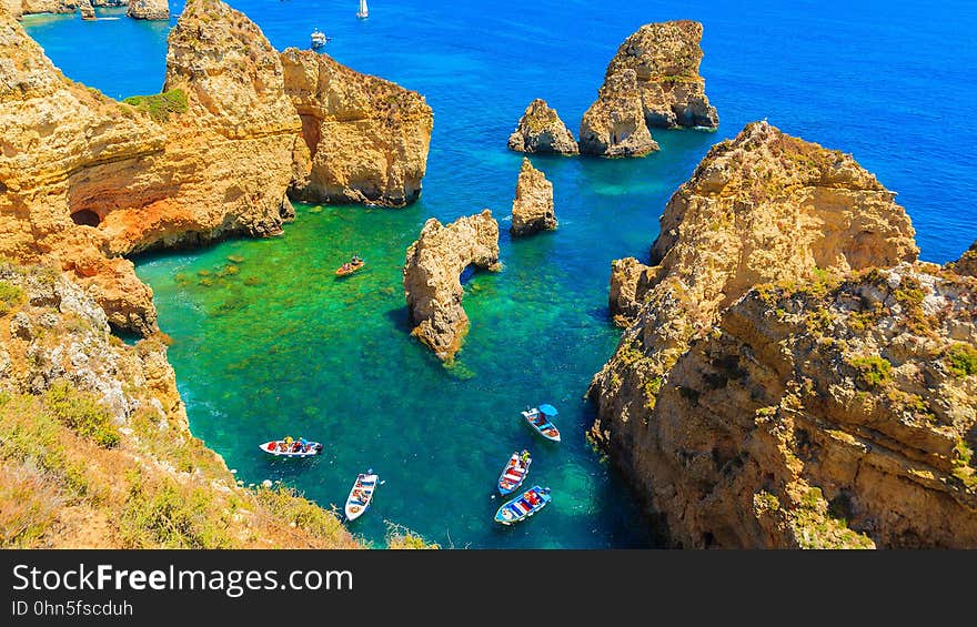 Boats among the cliffs at Ponta da Piedade in the Portuguese region of the Algarve.