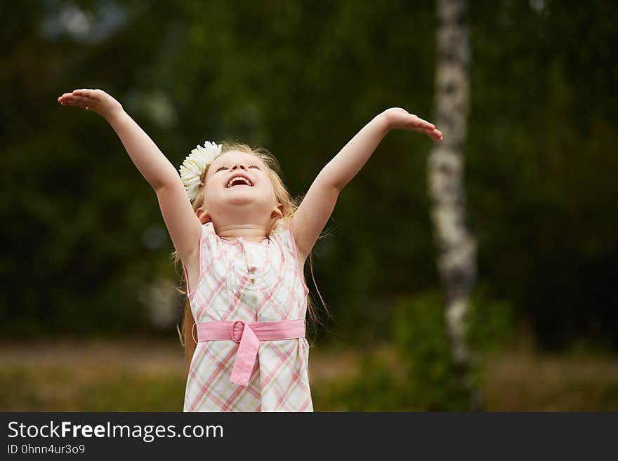 Young Girl Hands Up. Happy. Outdoors