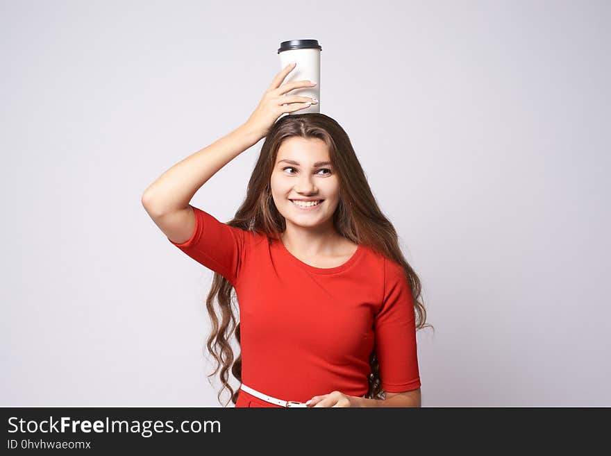 Portrait girl. Glass coffee. Happy smile. Red dress