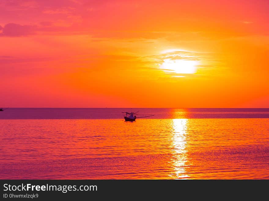 Bright colors at dawn on the beach at sunrise in the Gulf of Thailand. Bright colors at dawn on the beach at sunrise in the Gulf of Thailand.