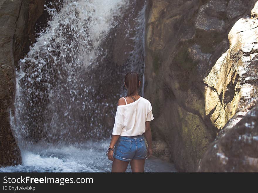 A girl and a waterfall