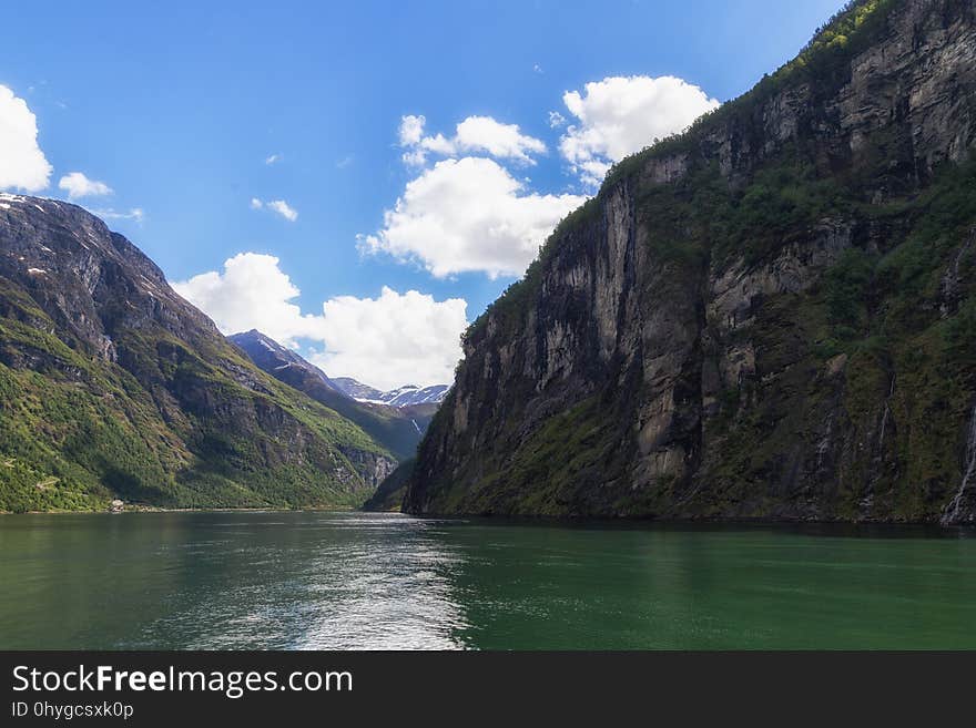 Cloud, Water, Sky, Mountain, Natural landscape, Fluvial landforms of streams