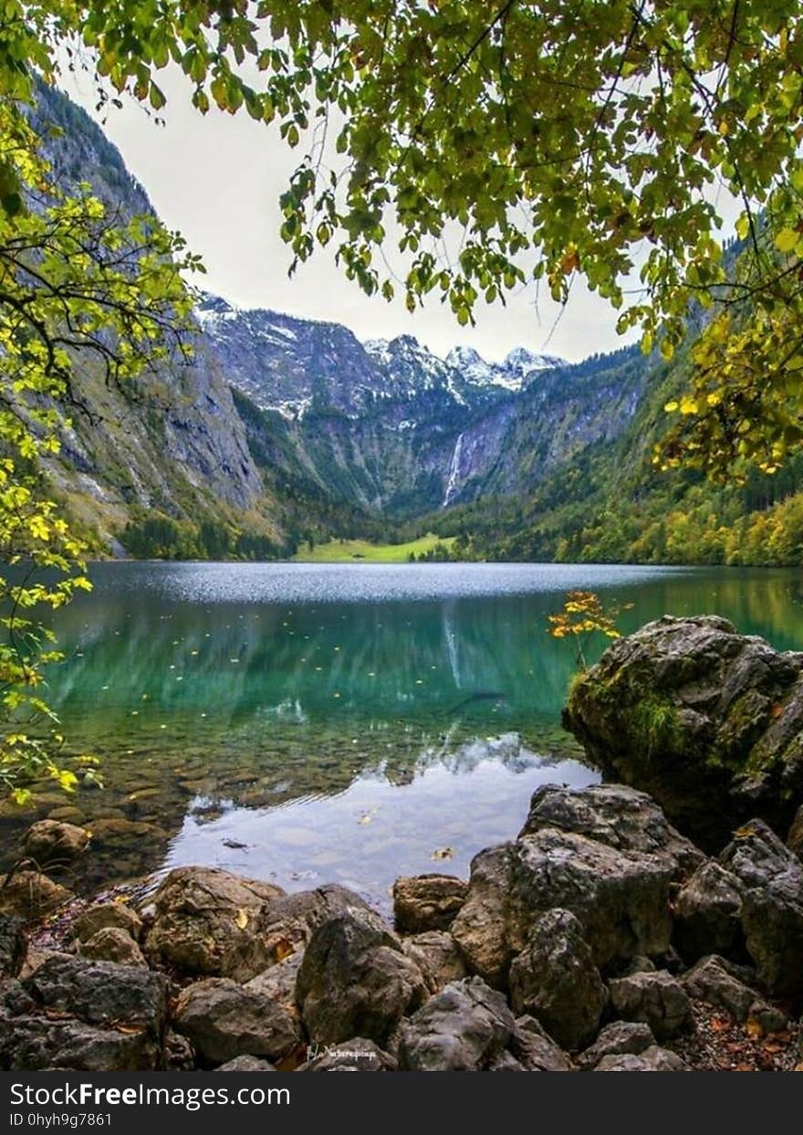 A mountain lake with a rocky coast.