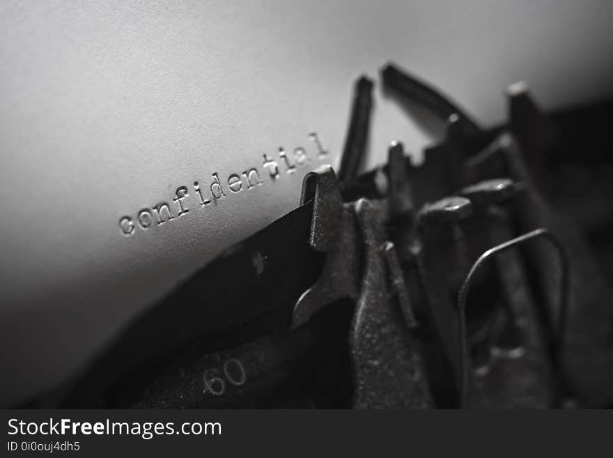 Old Typewriter With The Written Text Confidential.