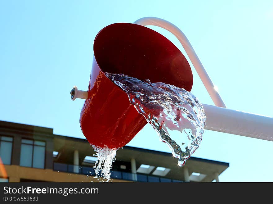 Bucket spilling water