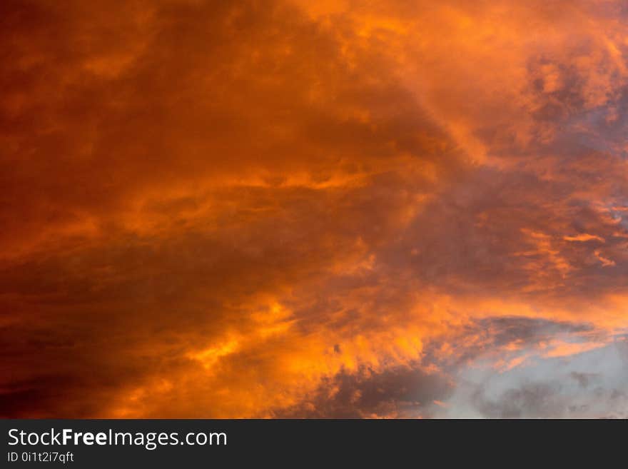 Summer sunset sky with clouds of red color. Summer sunset sky with clouds of red color.