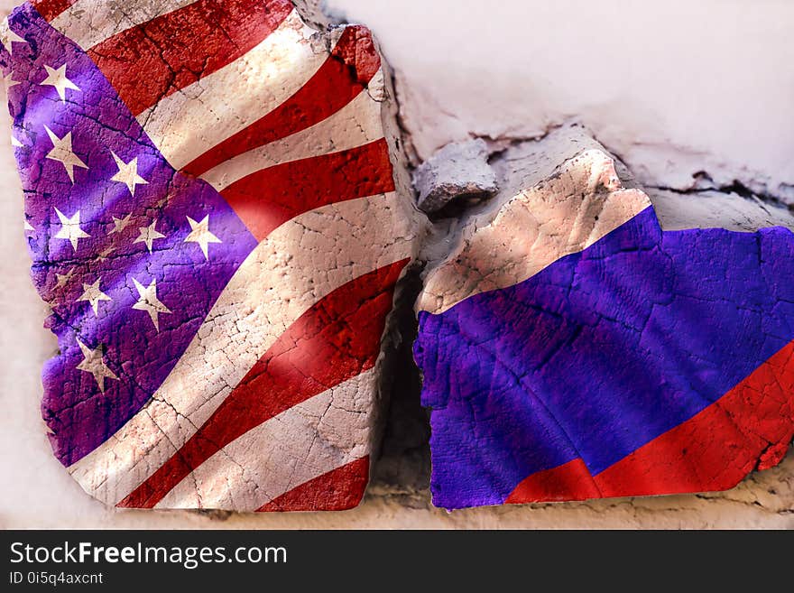 Symbol of crisis relations between countries. Square log wood with flags of USA and Russia