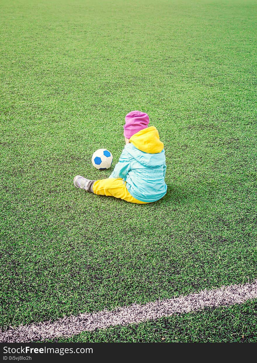 Little Girl Child On Football Field, In Sportswear, Training