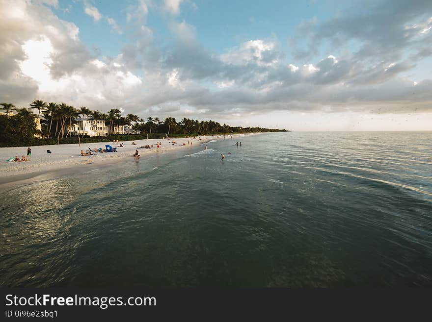 View of Beach Against Cloudy Sky