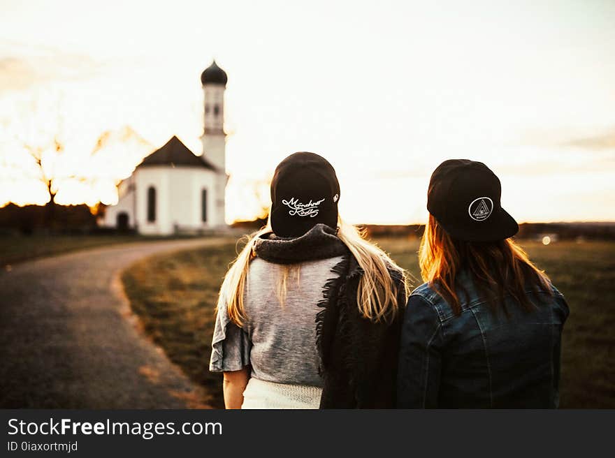 Woman Wearing Black Snapback Cap