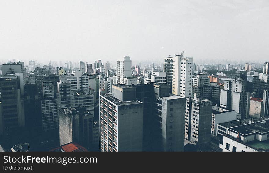 High Rise Building Under Cloudy Sky at Daytime