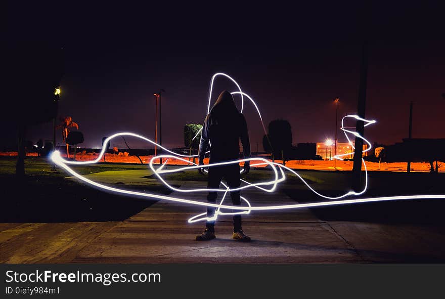 Photography of Person Wearing Hoodie Jacket