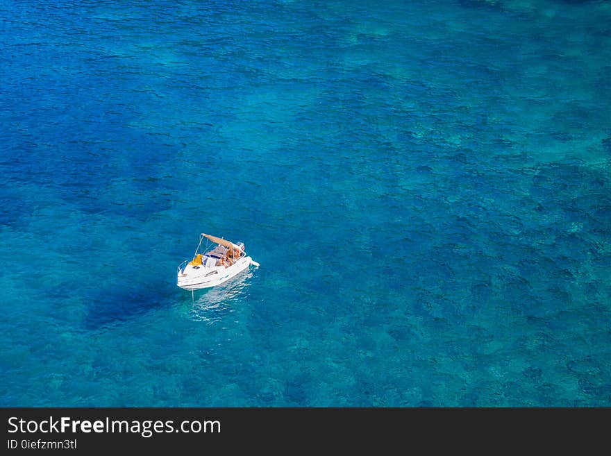 Boat In The Middle Of The Ocean