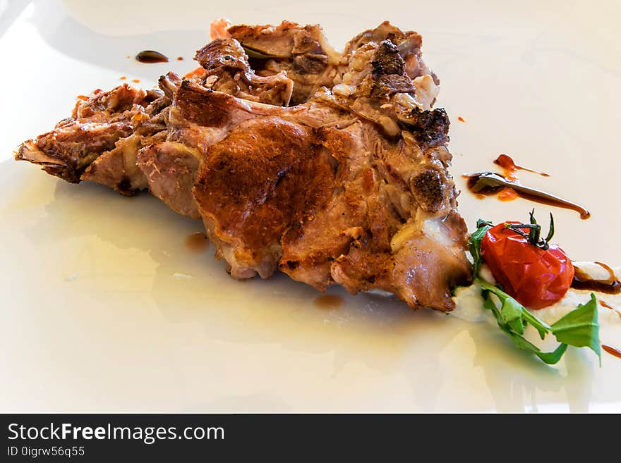 Plate of roast meat in the restaurant