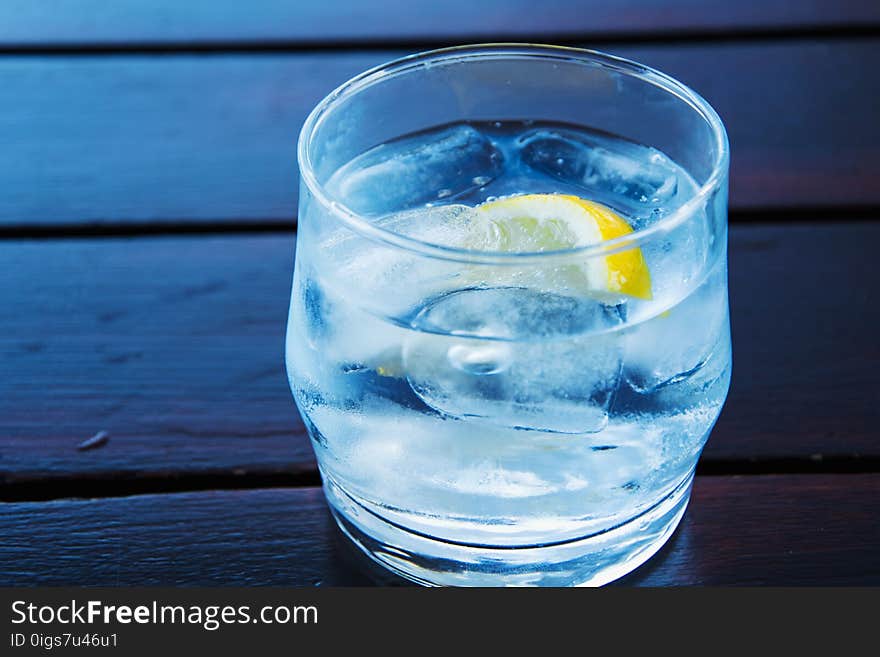 Cold drink with lemon slice