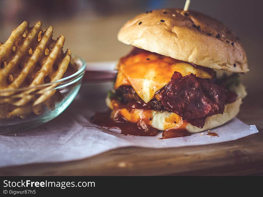 Closeup Photography of Bun With Cheese, Patty, Egg, and Bacon