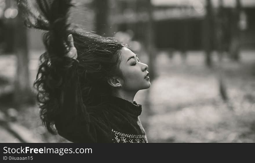 Gray Scale of Woman in Black Crew Neck Long Sleeve Shirt