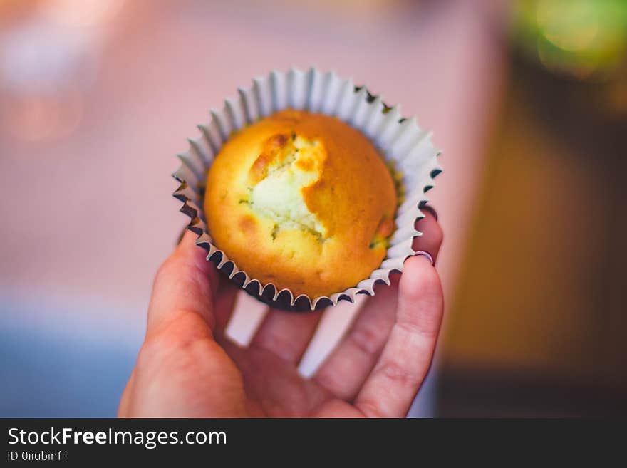 Person Holding Muffin