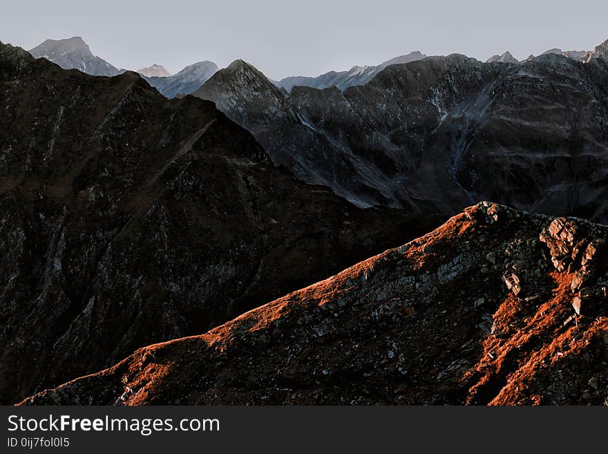 Rocky Mountain Under Gray Clouds