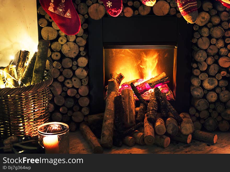 Brown Beside Fireplace Near Brown Wicker Basket