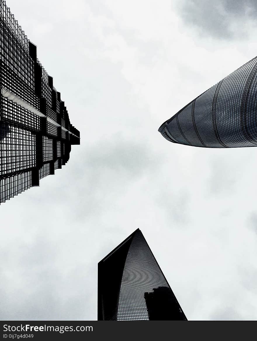 Low Angle Photo of Three High-rise Buildings