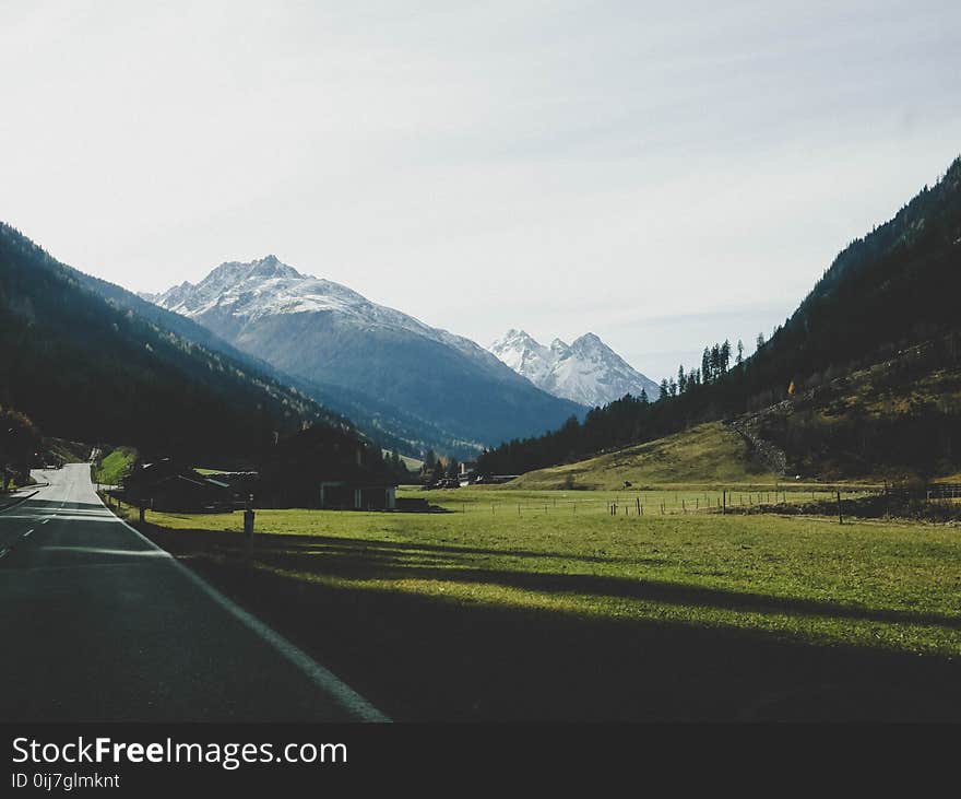 Landscape Photography of Mountains Near Road