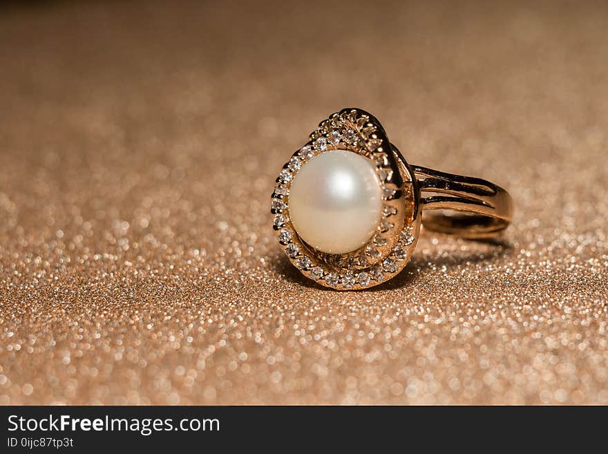 Luxury rose gold plated ring with freshwater pearl of white color. Luxury rose gold plated ring with freshwater pearl of white color.