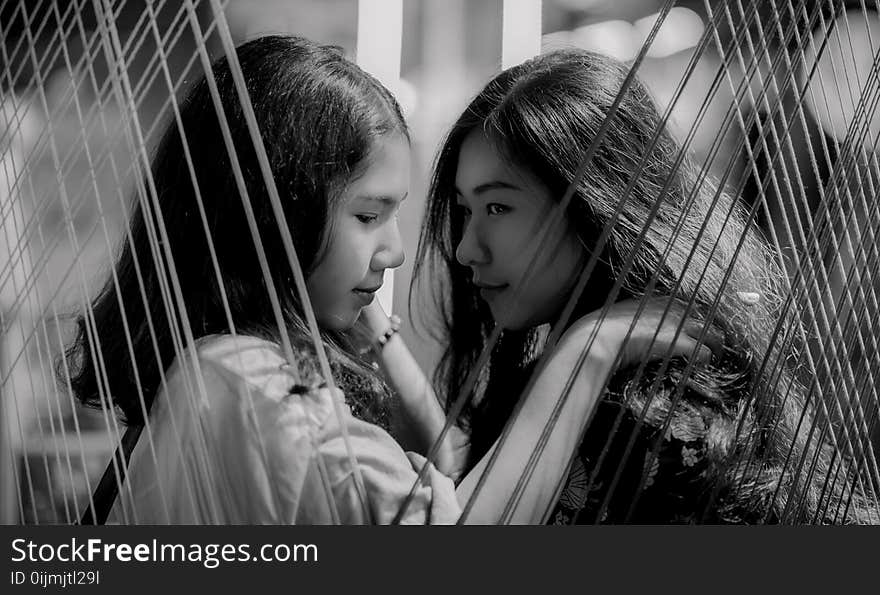 Grayscale Photography of Two Girls