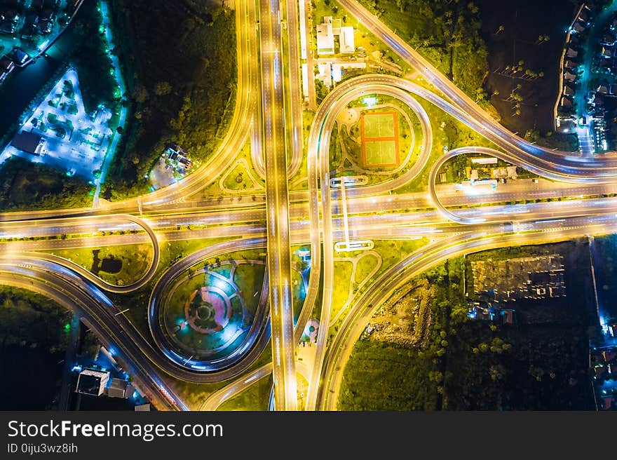 Look down view over the highway at night on expressway and motorway, Aerial view interchange of a city