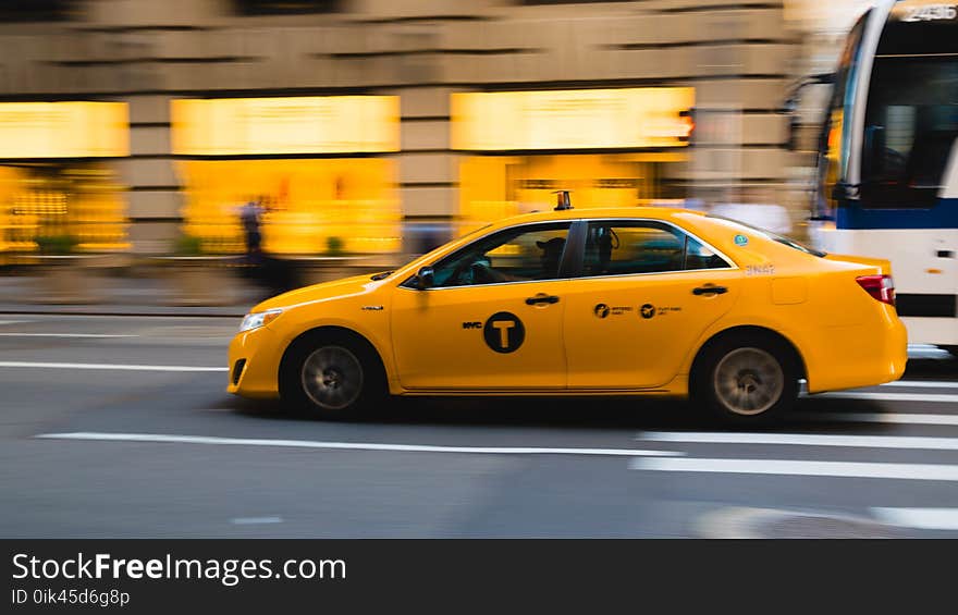 Taxi Overtaking Bus