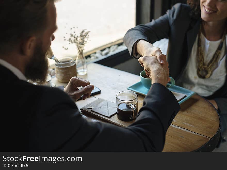 Man and Women Hand Shake