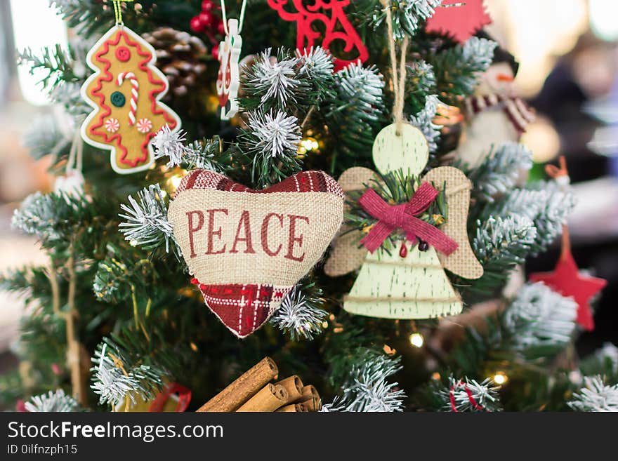 Merry Christmas and Happy New Year. Happy holidays. Christmas tree. Heart with inscription peace