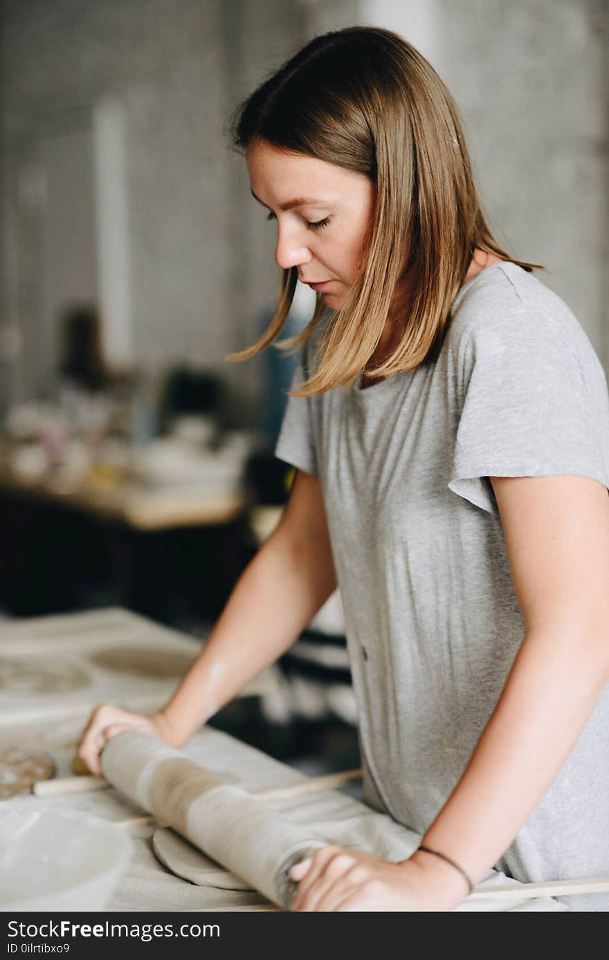 Woman Working At Pottery Studio