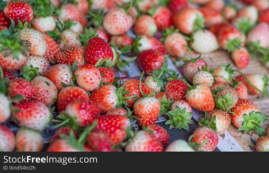 group of fresh strawberry on paper