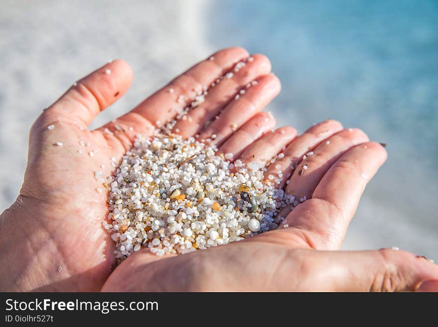 Colorful little stones on Is Arutas beach, Sardinia, Italy, Europe. Is Arutas is known as the beach of the grains of rice. Colorful little stones on Is Arutas beach, Sardinia, Italy, Europe. Is Arutas is known as the beach of the grains of rice.