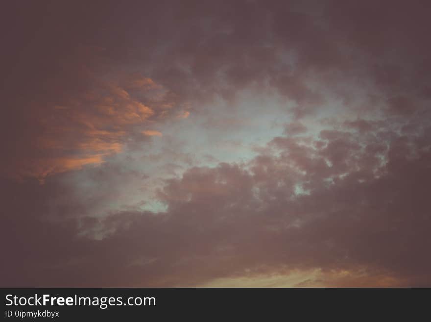 Summer sunset sky with clouds of red color, filtered background. Summer sunset sky with clouds of red color, filtered background.