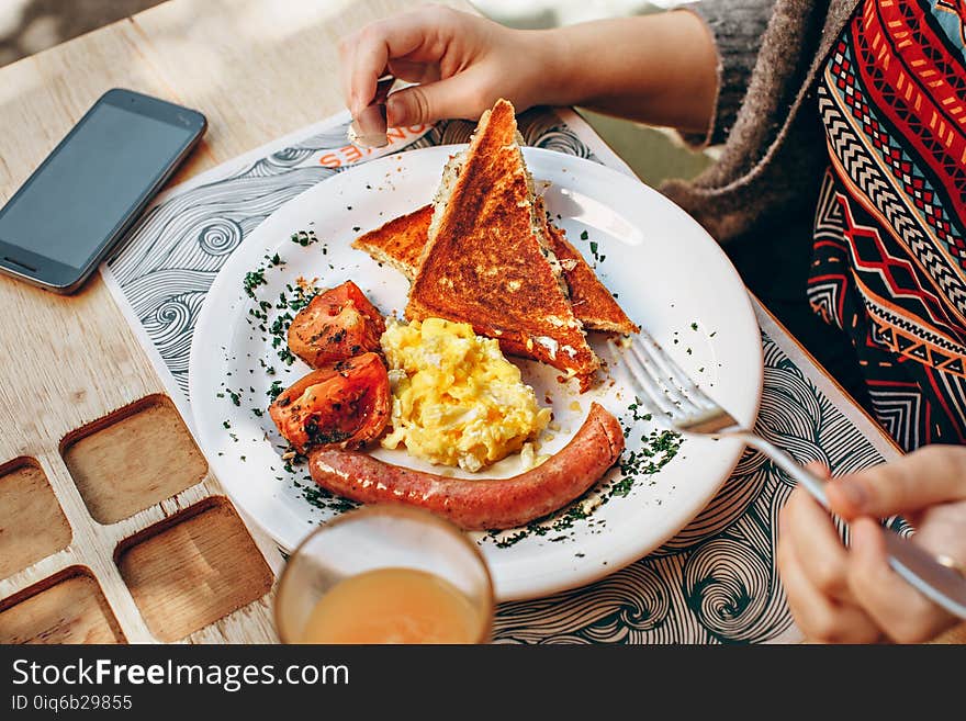 Toaster Bread, Scrambled Eggs, Grilled Tomato and Sausage