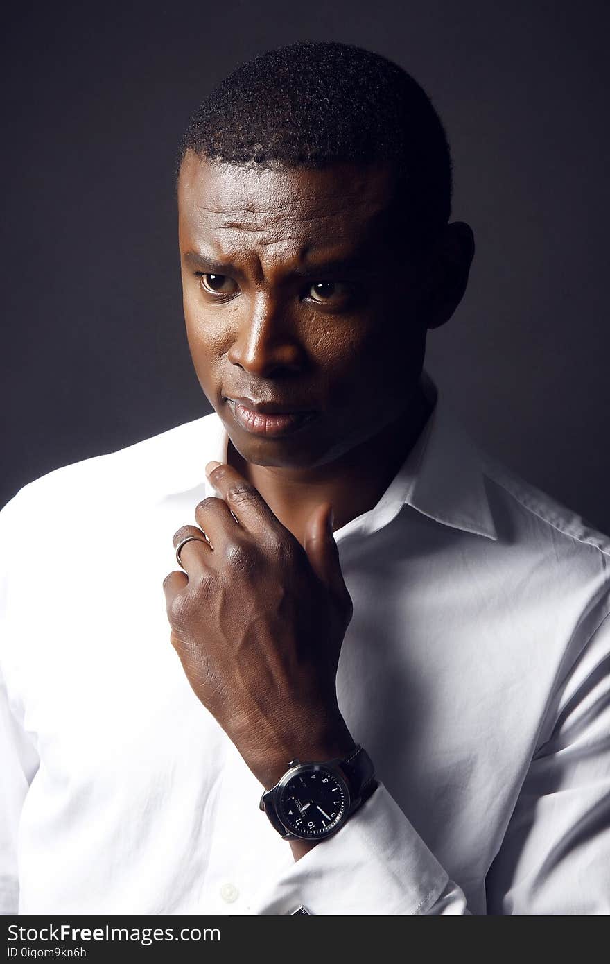 Photography of Man in White Shirt With Round Black Analog Watch