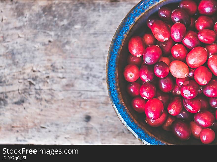 Bowl of Red Round Fruits