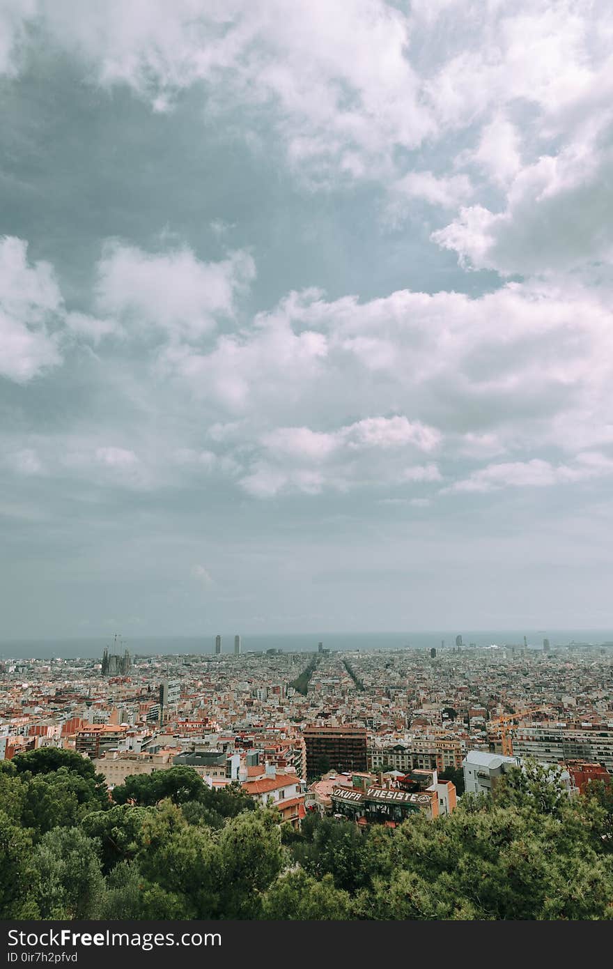 Concrete Structure Under White Clouds