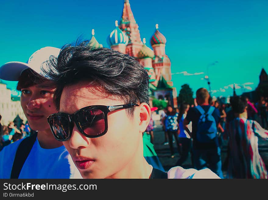 Close-up Photo of a Man Wearing Sunglasses