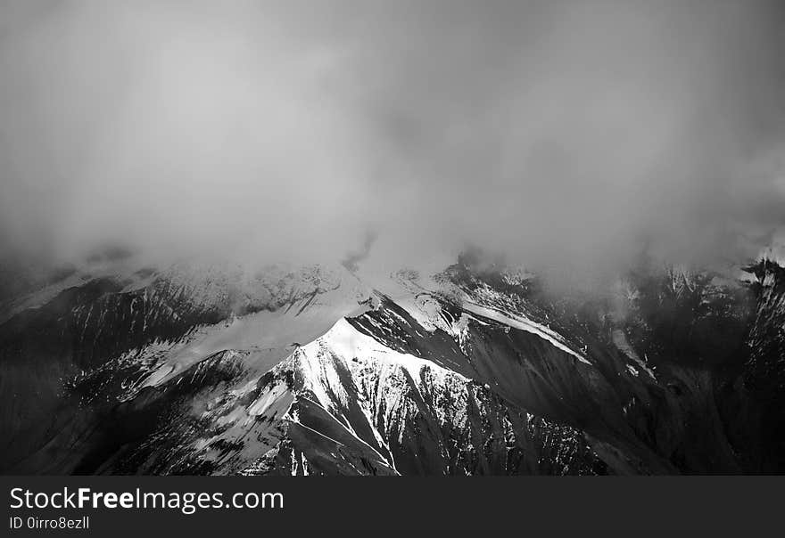 Snow Covered Mountain With Mist