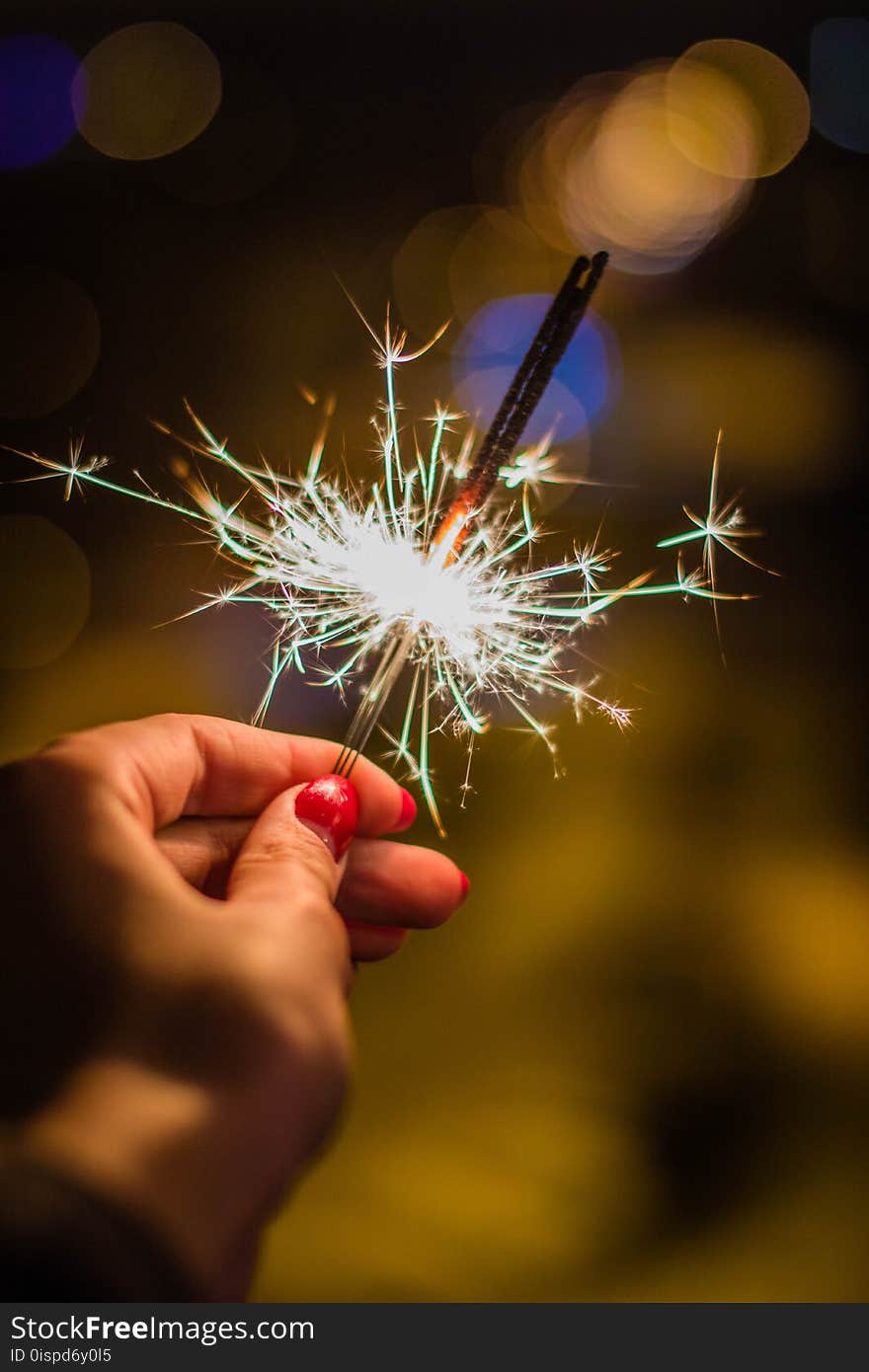 Person Holding Gray Firework