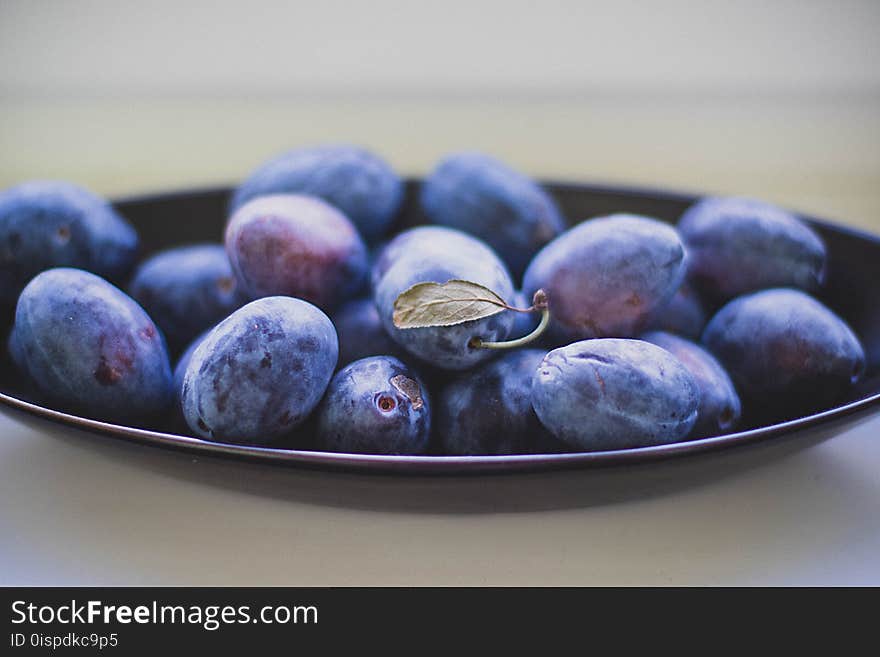 Black Berries on Top of Black Ceramic Plate