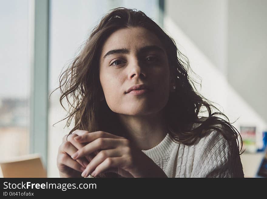 Woman in Grey Sweater