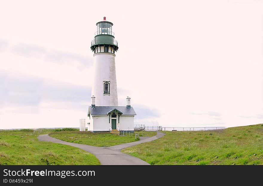 White and Gray Lighthouse Photo during Day