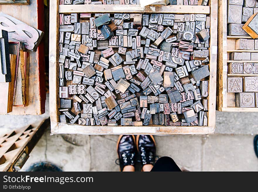 Assorted Wooden Alphabets Inside the Crate